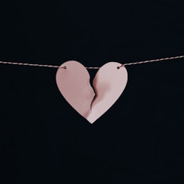 broken heart hanging on wire