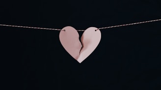 broken heart hanging on wire