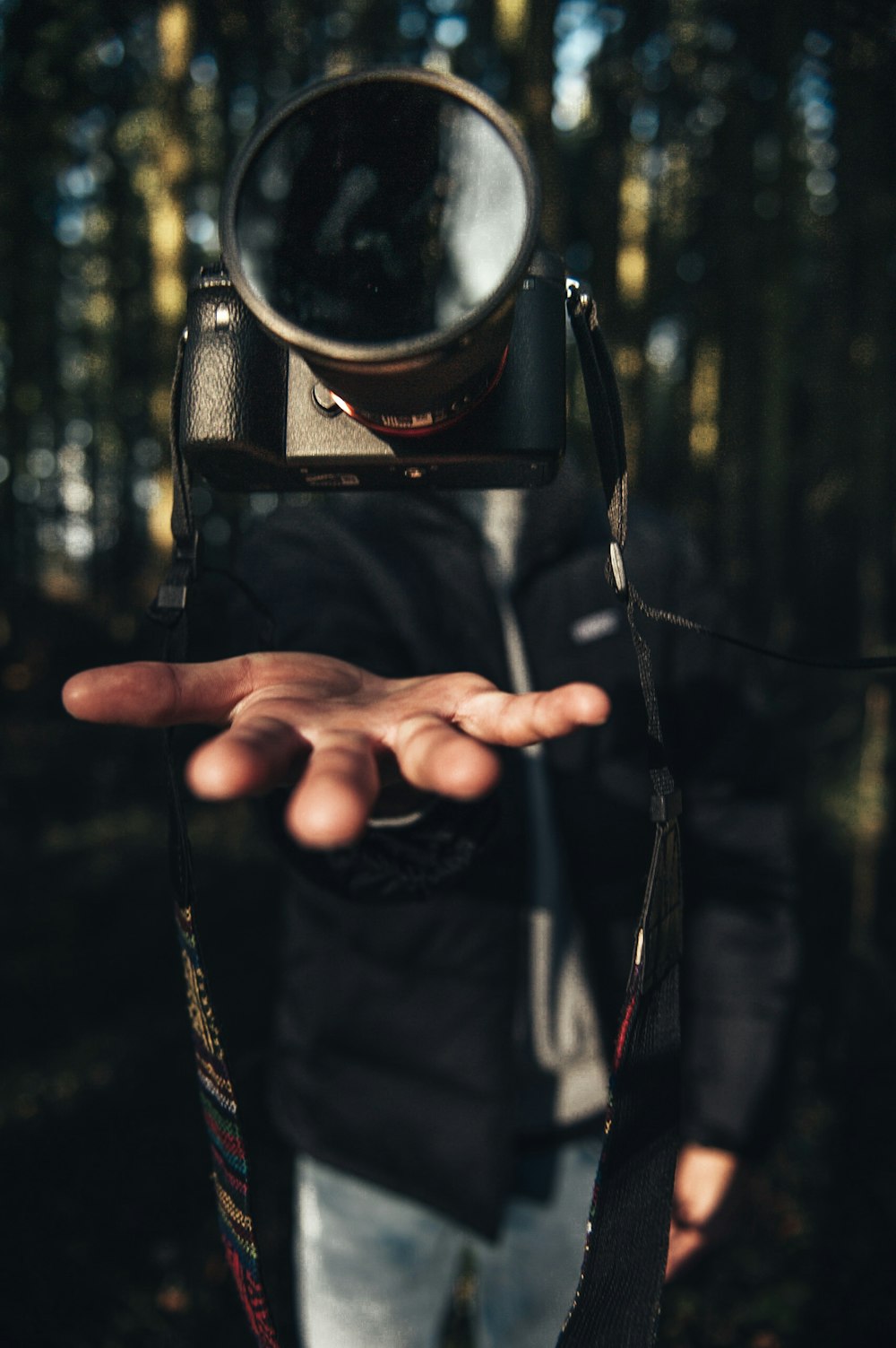 hanging black DSLR camera photography