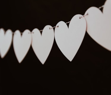 closeup photo of white heart bunting