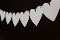 closeup photo of white heart bunting