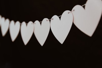 closeup photo of white heart bunting