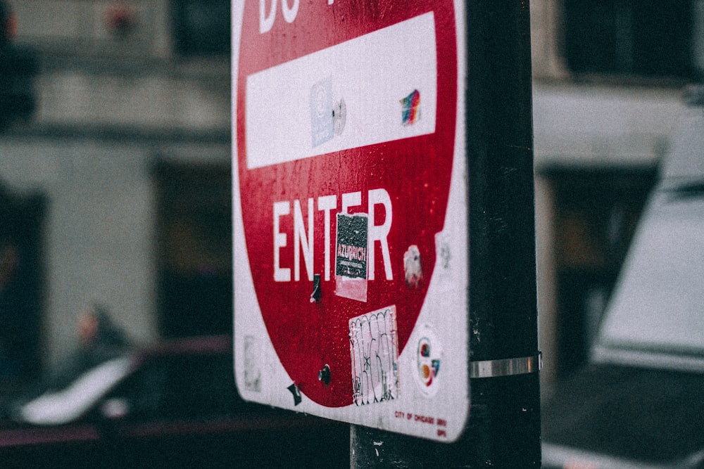 closeup photo of white and red do not enter signage