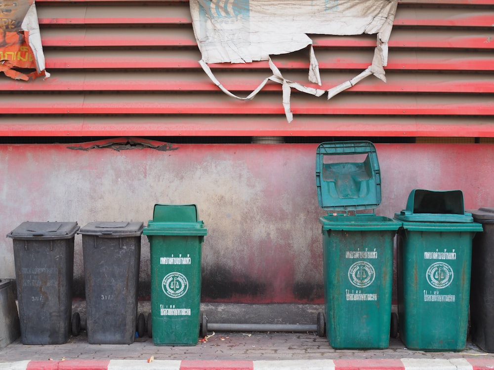 black and green trash bins