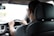 man driving car during daytime