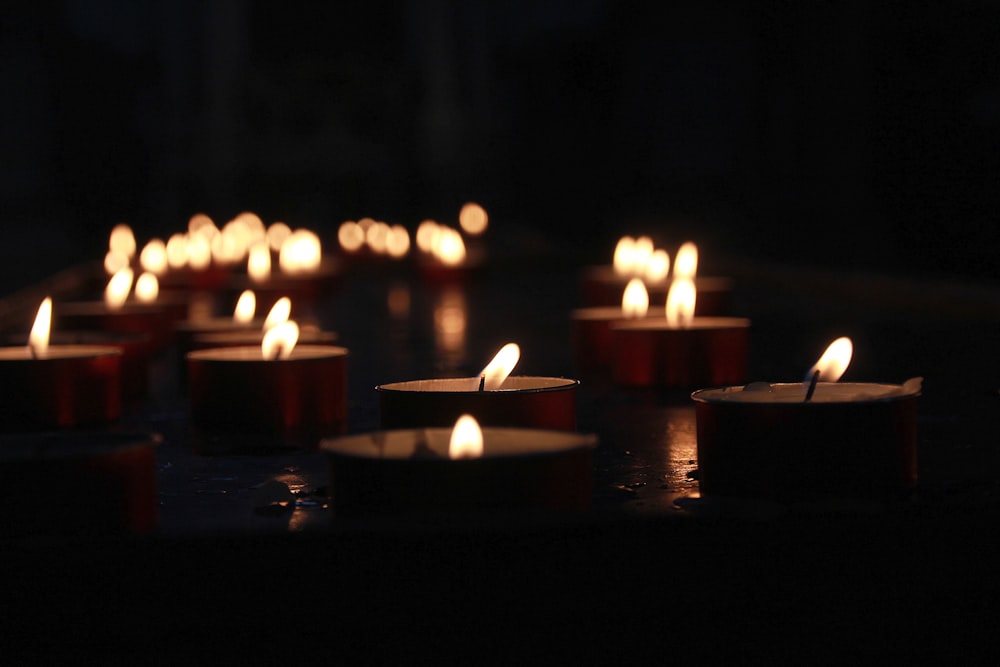 photo of lighted tealight candles