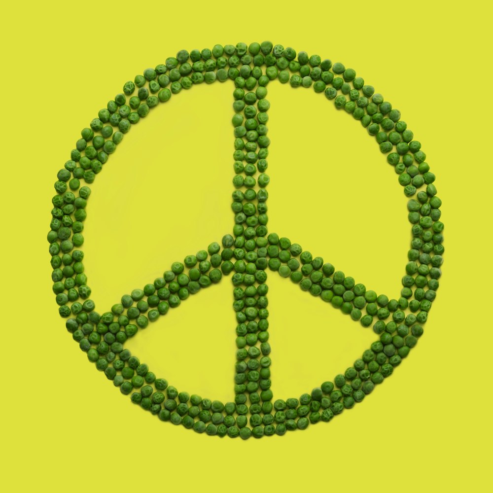 Grüne Erbsen Peace-Zeichen