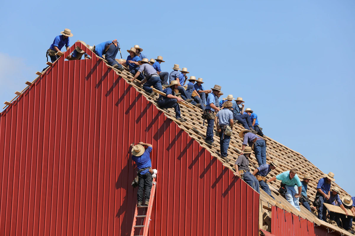 Residential house construction workers and building project