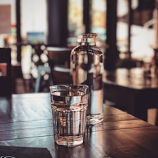 clear drinking glass on table