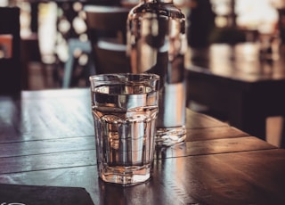 clear drinking glass on table