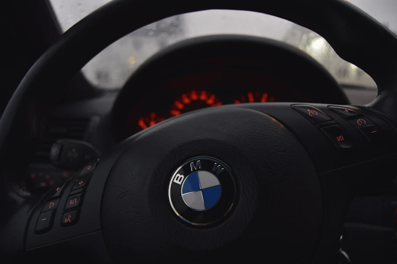 BMW steering wheel and dark interior