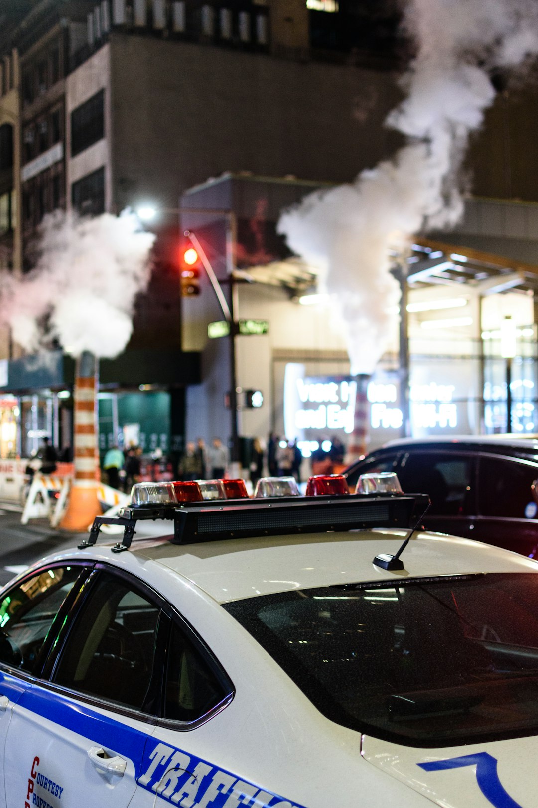 closeup photo of white police car