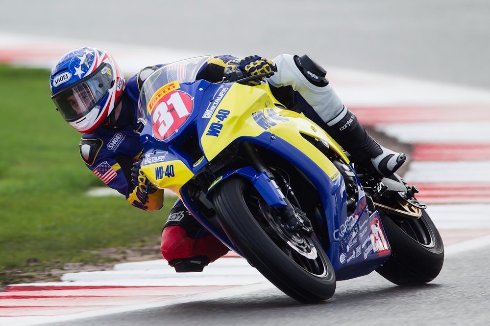 man riding sports bike