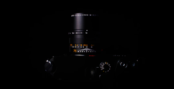Close-up of a high-end camera lens reflecting subtle lightning patterns, emphasizing precision and creativity.