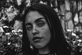 grayscale photo of woman's face
