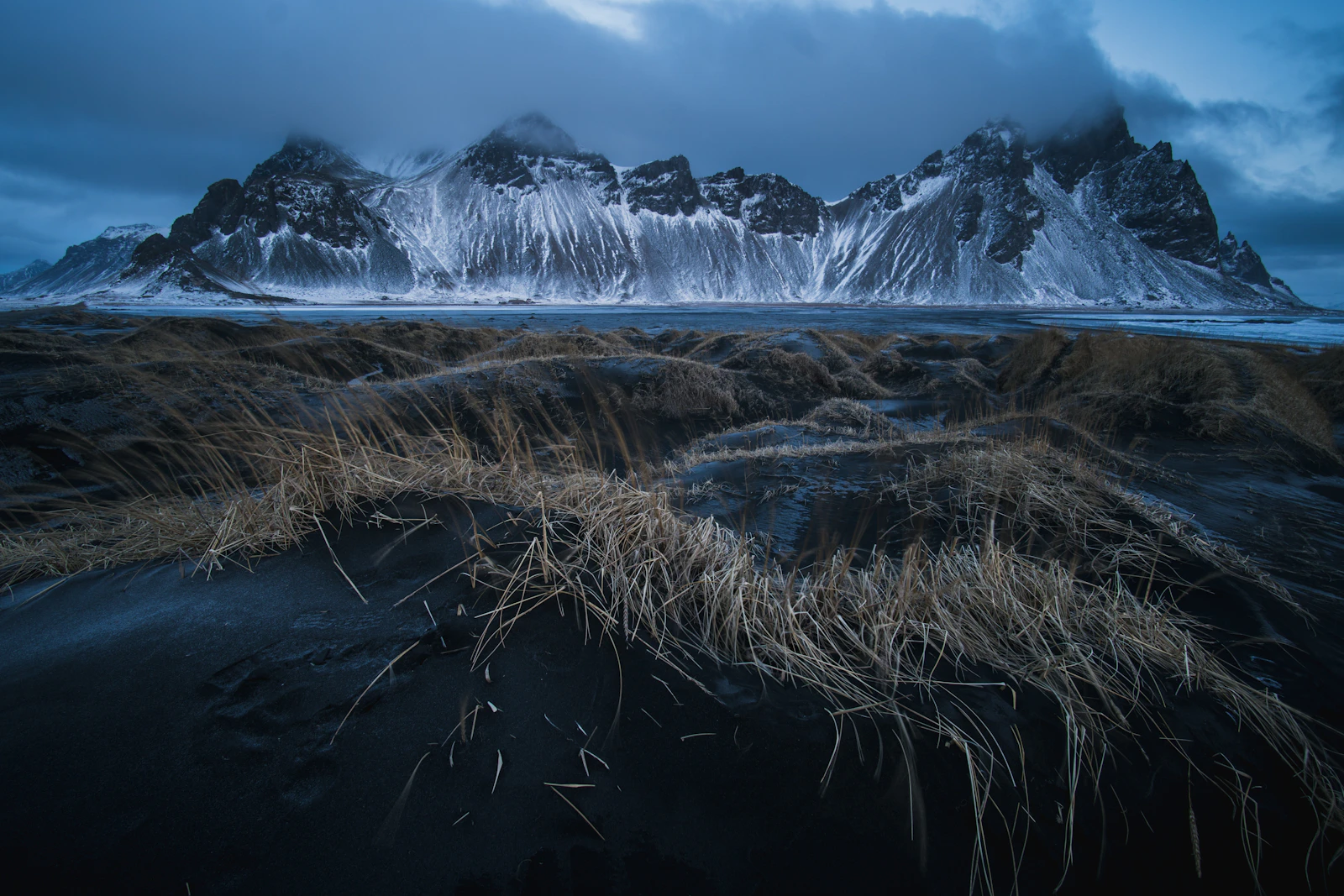 Vestrahorn in snow, seen across the dunes at Stokksnes near Höfn — Iceland