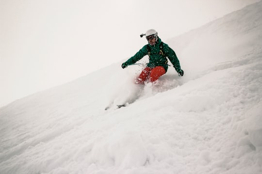 man playing snowboard in Les Contamines-Montjoie France