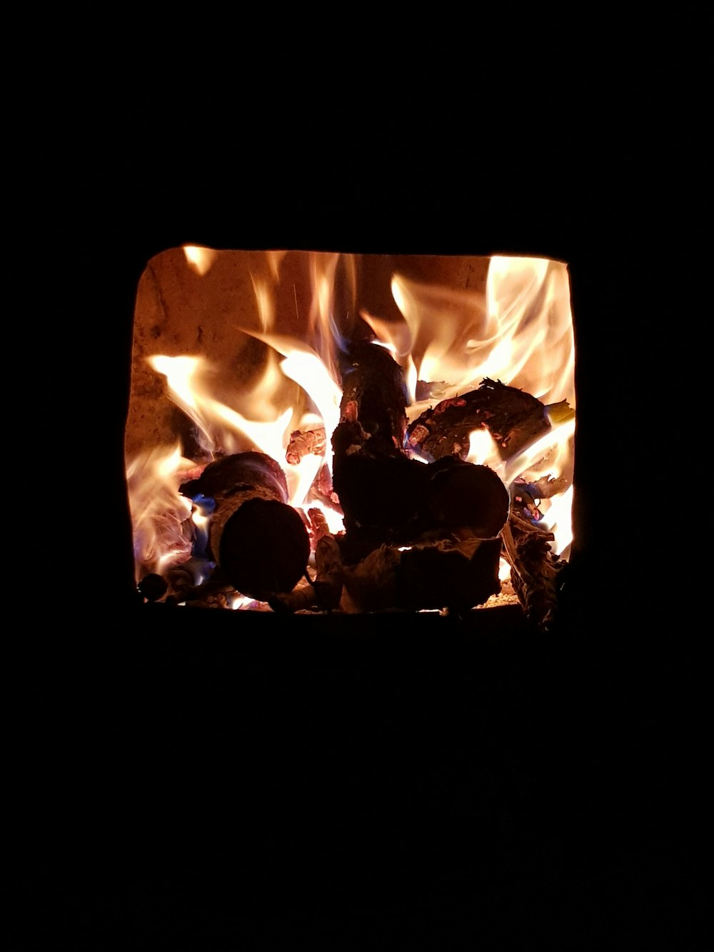 wood burning inside square container