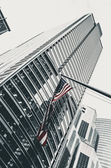 U.S.A. flag and skyscraper building