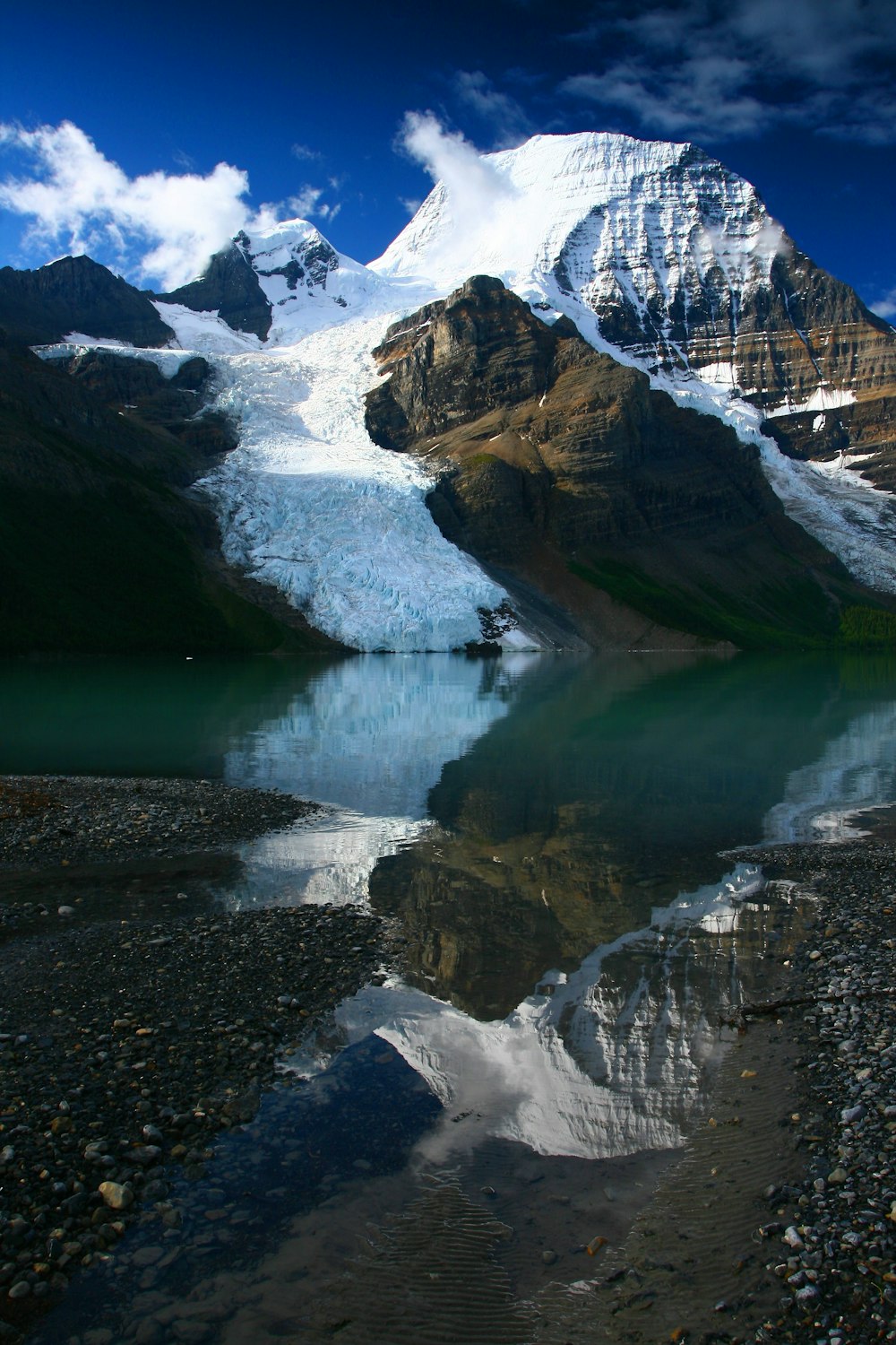 rocky mountain beside lake