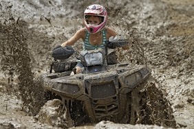 woman riding on off-road ATV