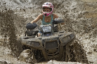 woman riding on off-road ATV