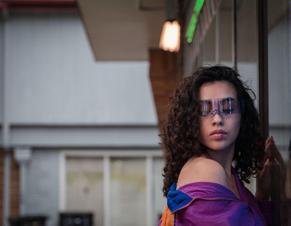 woman in purple top posing