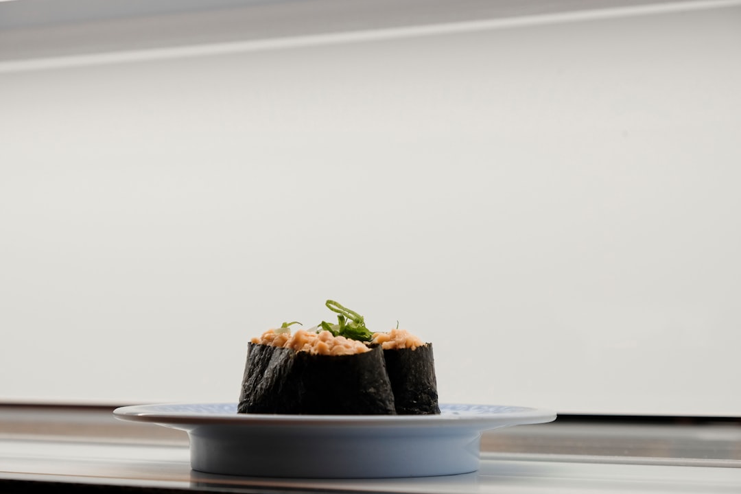 sushi served on white ceramic saucer