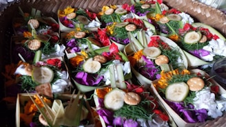 Fresh flowers and dried herbs arranged for traditional pooja offerings.