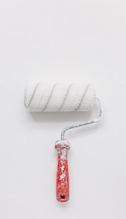 white paint roller