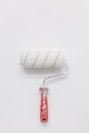 white paint roller