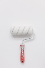 white paint roller