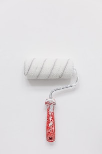 white paint roller