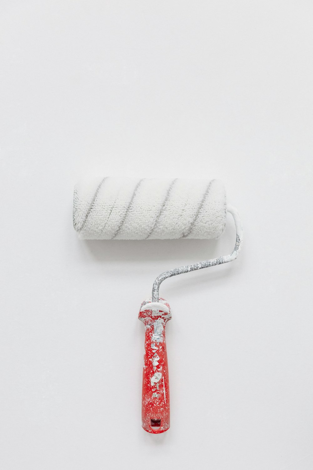 white paint roller