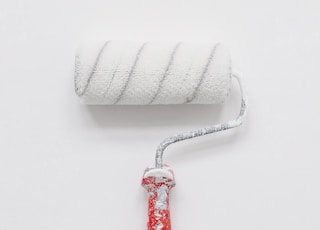 white paint roller