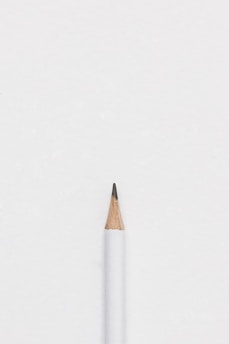 white lead pencil on surface