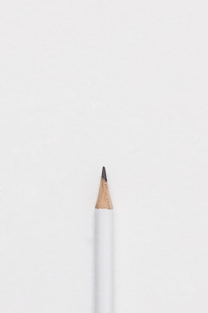 white lead pencil on surface