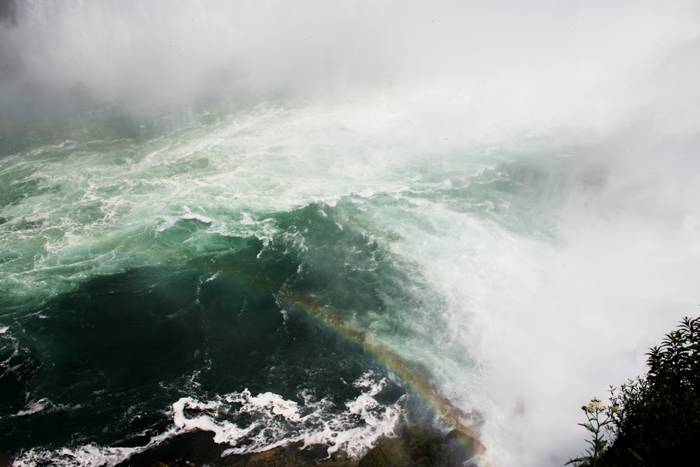 time lapse photography of body of water