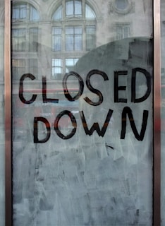glass window with Closed down print