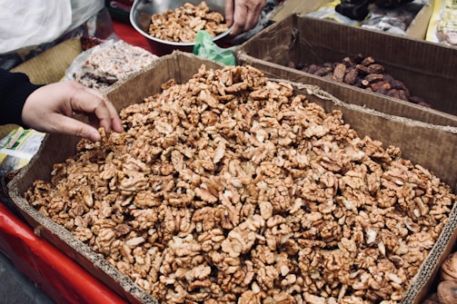 Shelves filled with neatly packaged walnuts ready for wholesale distribution.