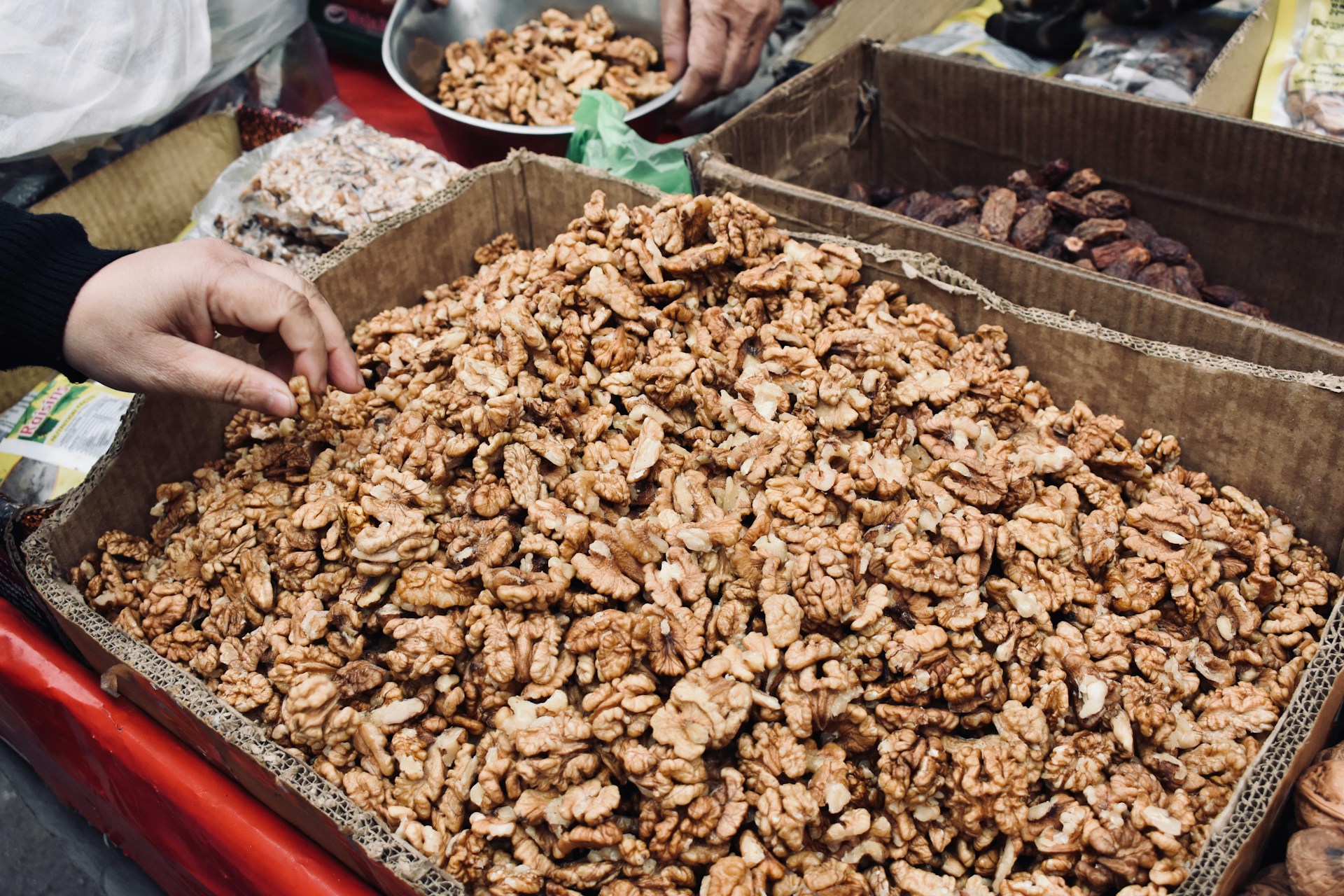 woman wearing yellow long-sleeved dress under white clouds and blue sky during daytime