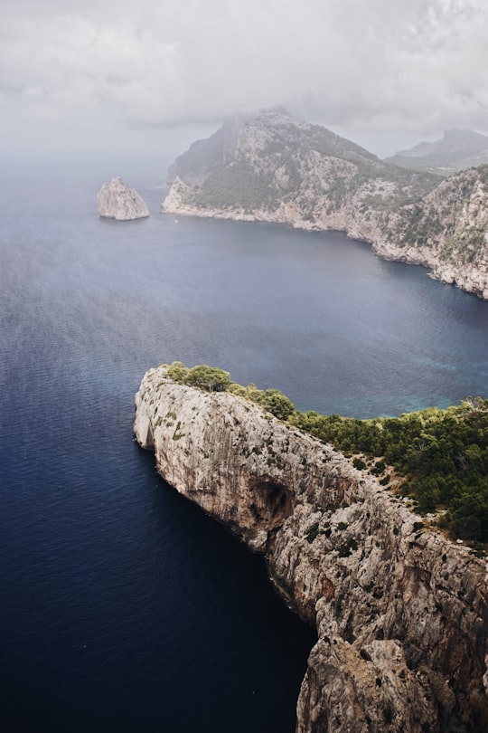 aerial photo of gray rocky islands beside body of water during daytime in Majorca Spain