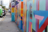 An art print displaying a colorful street art scene.