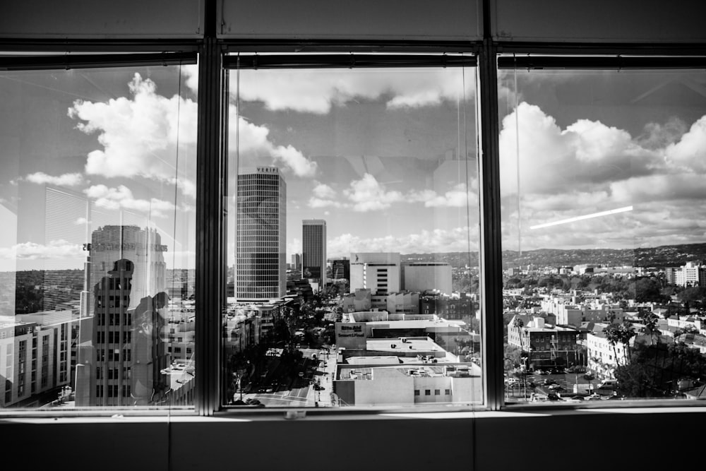 grayscale photo of high rise buildings