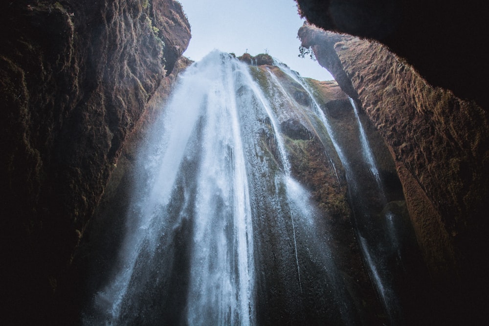 worm's eye view of waterfalls