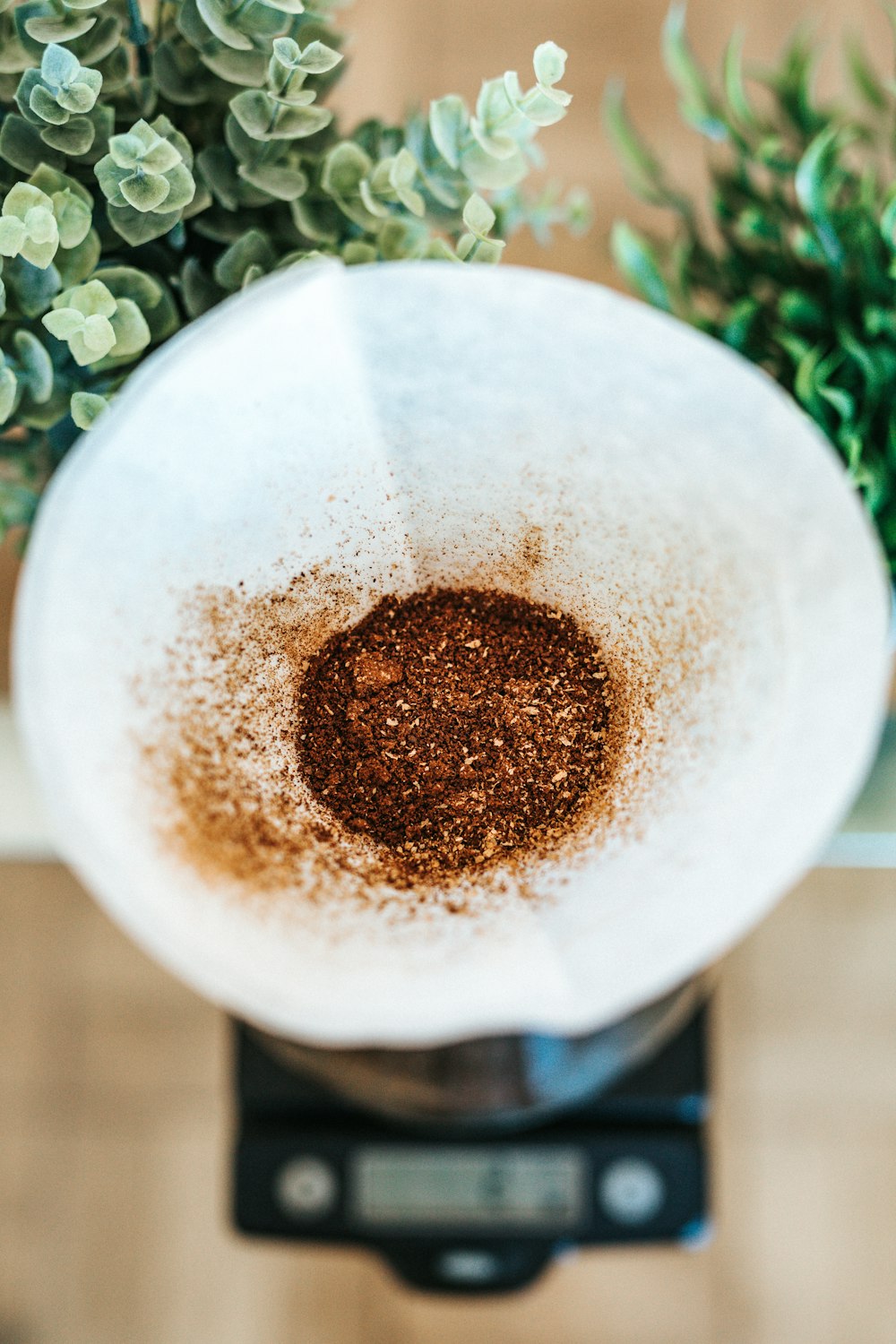 selective focus photography of paper with brown powders