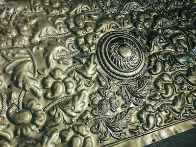 A finely crafted antique metal showpiece with intricate detailing, reflecting Moradabad's rich artisan heritage.
