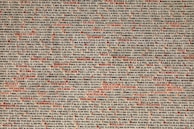 Close-up of archival documents with highlighted names and dates.