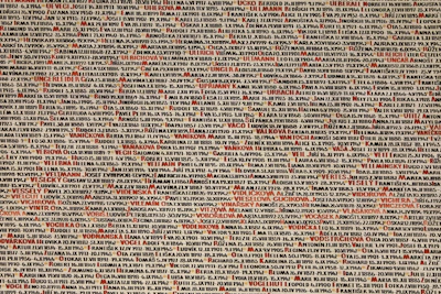 A proud owner’s name written in an old ledger book surrounded by sepia-toned railroad photos.