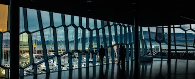 Bright living room with floor-to-ceiling windows and marina views
